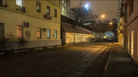 Crowd of people walking along tramway and train railings, time lapse Stock Footage 69780945
