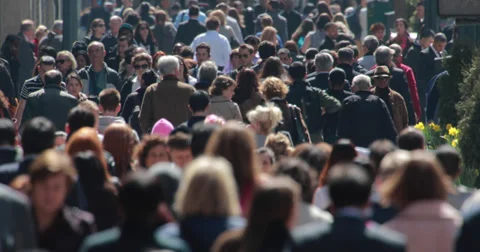 Crowd of people walking on city crowded street sidewalk 4k slow motion Stock Footage