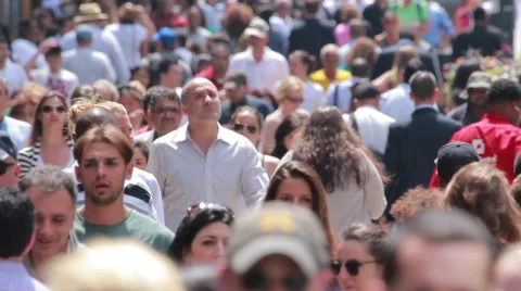 Crowd of people walking on city crowded busy street sidewalk Stock Footage