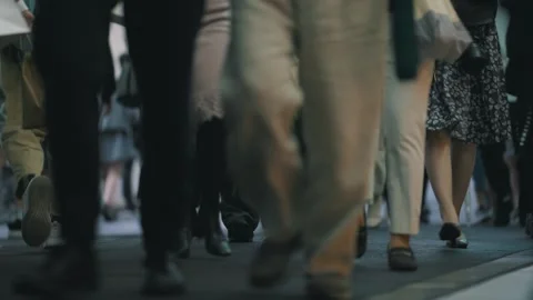 Crowd people walking. Close up legs of a crowd of people walking down the street 스톡 동영상 252952702