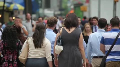 Crowd of people walking crossing street New York Stock Footage