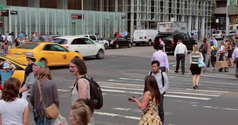 Crowd of people walking crossing street intersection time-lapse 4k Stock Footage 41017635