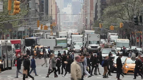 Crowd of people walking crossing street in New York City Stock Footage