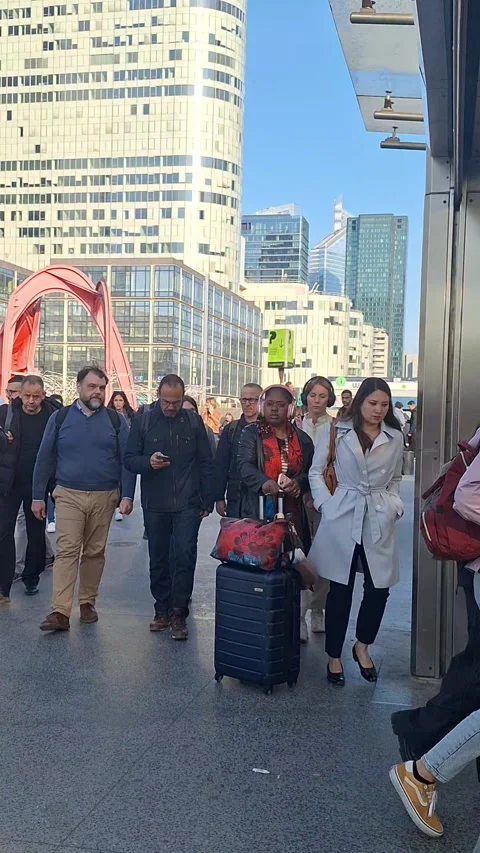Crowd of people walking in La Defense business district, Paris Stock Footage 332726005