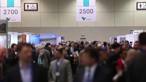 Crowd of people walking by in large hall Stock-Footage 73753954