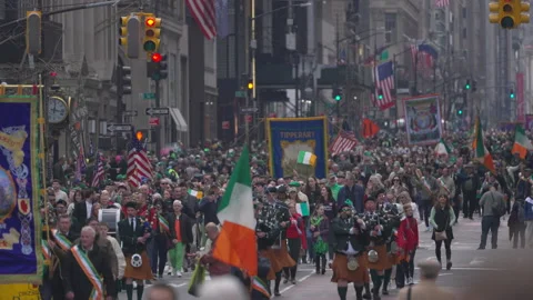 Crowd of people walking marching in New York City St. Patrick's day parade 2023 Stock-Footage 236261203