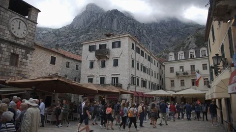 A crowd of people walking on the square old town of Kotor. Montenegro 2019 Stock Footage 119061965