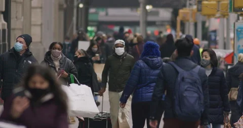 Crowd of people walking street mask mask... | Stock Video | Pond5