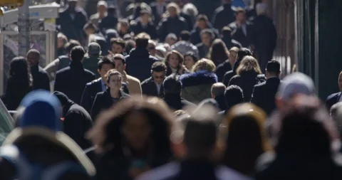 Crowd of people walking street in New York City slow motion Stock Footage