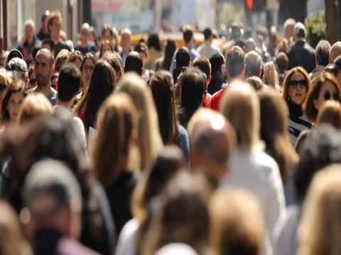 Crowd of people walking street slow motion Stock Footage