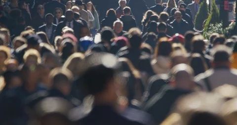 Crowd of people walking street slow motion backlit New York City Stock Footage