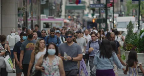 Crowd of people walking street some wea... | Stock Video | Pond5