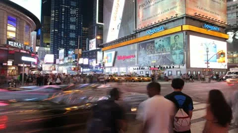 Crowd of people walking in Times Square New York City at night time lapse 30p Stock Footage