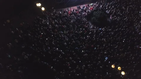 A crowd of people watching the display on the screen  Aerial view Video stock 112137503