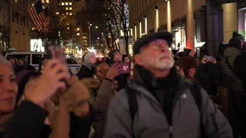 Crowd of people at a winter night looking at something [SloMo] Stock Footage 164112619