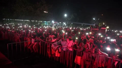 Crowd with phone lights Stock Footage 167776641