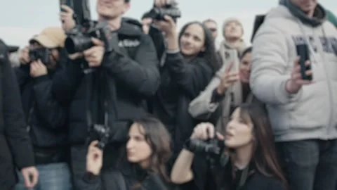 Crowd of photographers capturing a newsworthy event Stock Footage 314985222