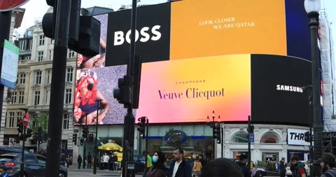 Crowd at Piccadilly Circus under giant LED advertising screens Stock Footage 321032458