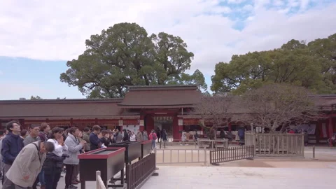 Crowd of pilgrims queuing to pray at main hall of Dazaifu shrine. Stock-Footage 255542538