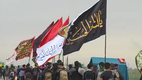 Crowd of pilgrims walking in Arbaeen pilgrimage in Karbala, Iraq Video stock 136436711