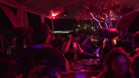 Crowd POV Dancing at Beach Club Electronic Music Party at Night Stock Footage 337902876