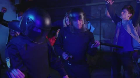 Crowd of protesters and cops celebrating friendship unity after massive protest Stock Footage 133287370