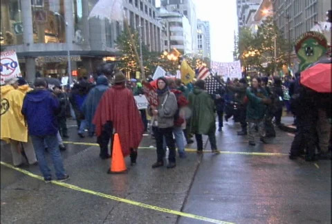 Crowd of Protesters Linking Arms at WTO Protests Stock Footage 106958568