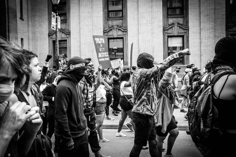 Crowd protesting for justice in city Stock Photos