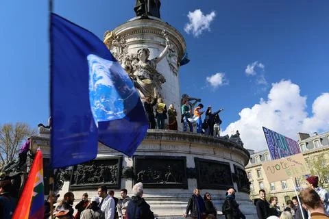 Crowd protesting in Paris for climate and social issues Stock Photos