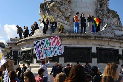 Crowd protesting in Paris for climate and social issues Stock Photos