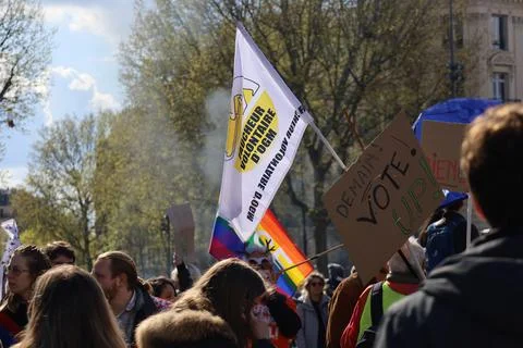 Crowd protesting in Paris for climate and social issues Stock Photos