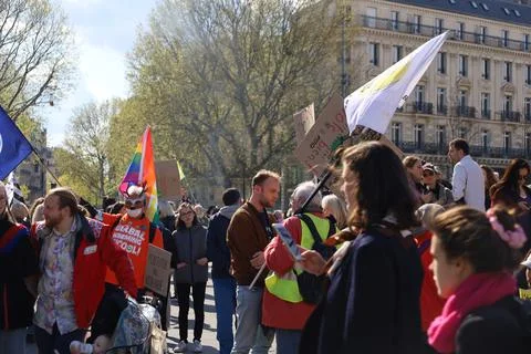 Crowd protesting in Paris for climate and social issues Stock Photos
