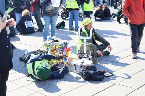 Crowd protesting in Paris for climate and social issues Фото