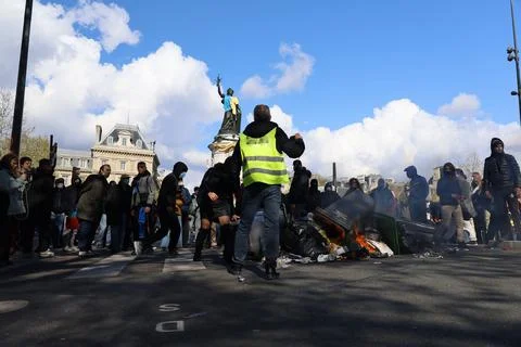 Crowd protesting in Paris for climate and social issues Stock Photos