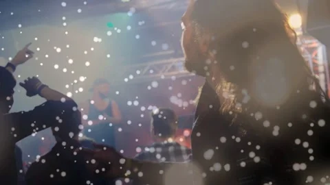 Crowd raising hands and swaying at live music performance, performer dropping Stock Footage 333602642
