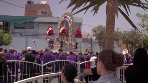 Crowd at religious procession honouring the Lord of Miracles, Lima, Peru Video stock 320373271