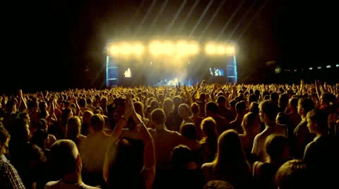 Crowd at a rock concert, back light silhouette Stock Footage
