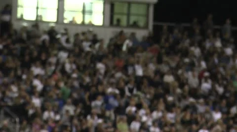 Crowd Roots For Local Football Team Stock Footage