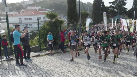 Crowd of Runners start running for charity Stock Footage 140224435