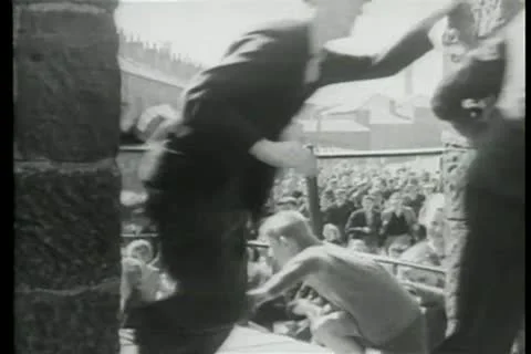 Crowd running through street Stock Footage 11352657