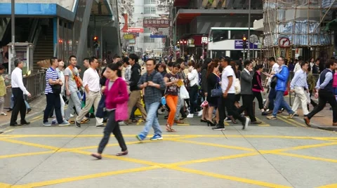 Crowd rush through crosswalk, glide dolly parallel shot, citizens walk Stock Footage 55688759