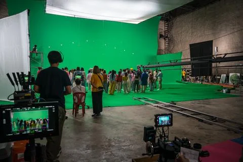 Crowd shooting on a chroma set Stock Photos