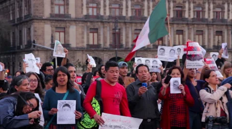 Crowd shouting slogans in a march protest for the students disappeared Guerrero Stock Footage 44347017