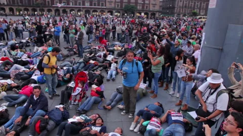 Crowd shouting slogans in a march protest for the students disappeared Guerrero Stock Footage 44349629