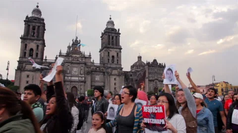 Crowd shouting slogans in a march protest for the students disappeared Guerrero Stock Footage 44350452