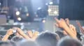 Crowd with smartphones and cameras at concert HD Footage