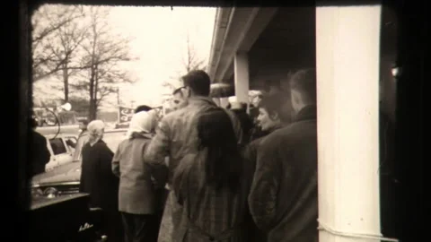 Crowd of Spectators Outside Courthouse to Watch Convict At Trial Stock Footage 130738288