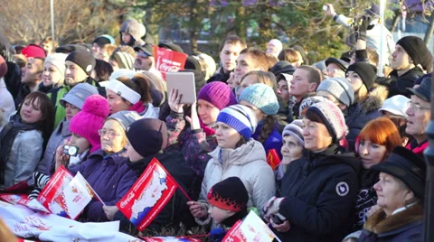 Crowd of spectators at Sochi2014 Olympic torch relay in Petrozavodsk Stock Footage 32691451