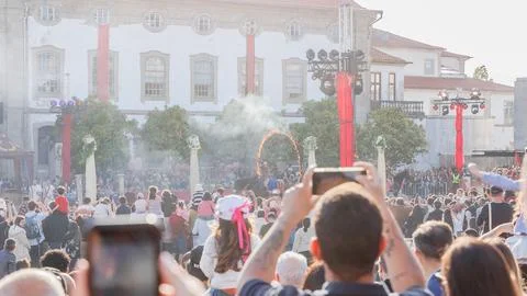 Crowd of spectators watching a show in front of the town hall of Braga, Por.. Stock Photos