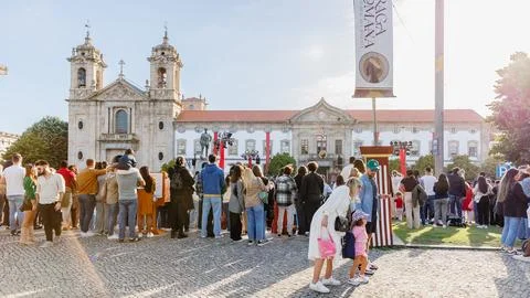 Crowd of spectators watching a show in front of the town hall of Braga, Por.. Stock Photos